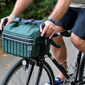 roll-top basket bag on a bike